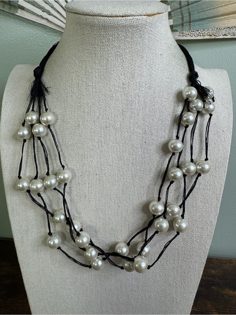 Multi-Strand Black Cord Necklace with White Glass Pearls and Tassel Accents